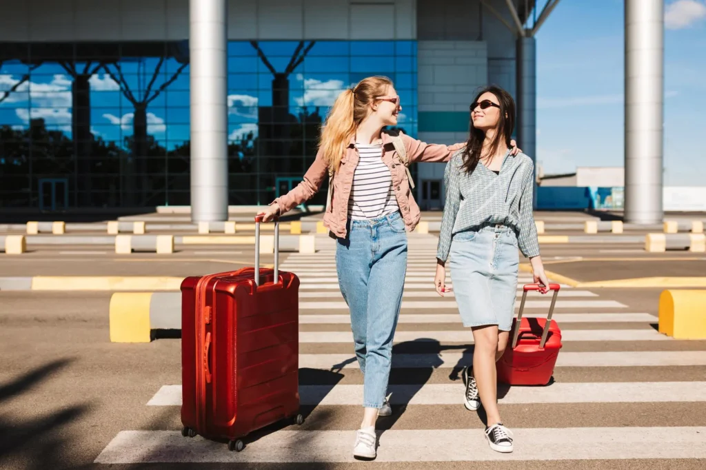 Pictured are two girls at the airport ready to leave
